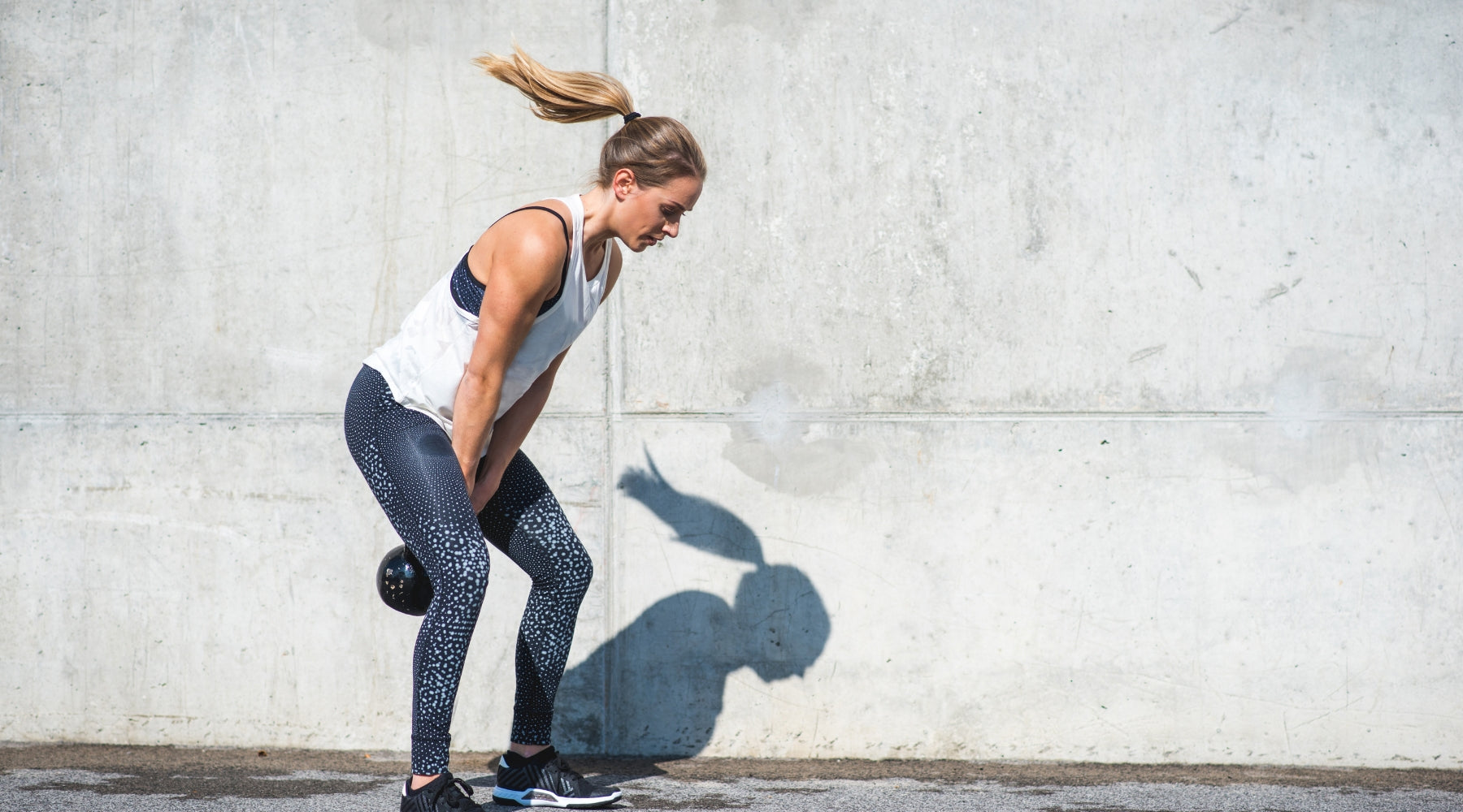 Træning med kettlebells fra NORDIC POWER, læs om Squat træningsøvelsen her